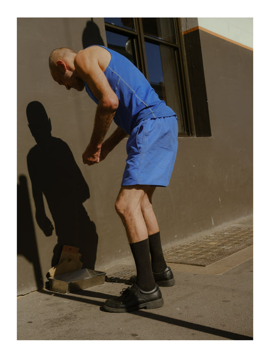 In the Shadow of the Blue Man